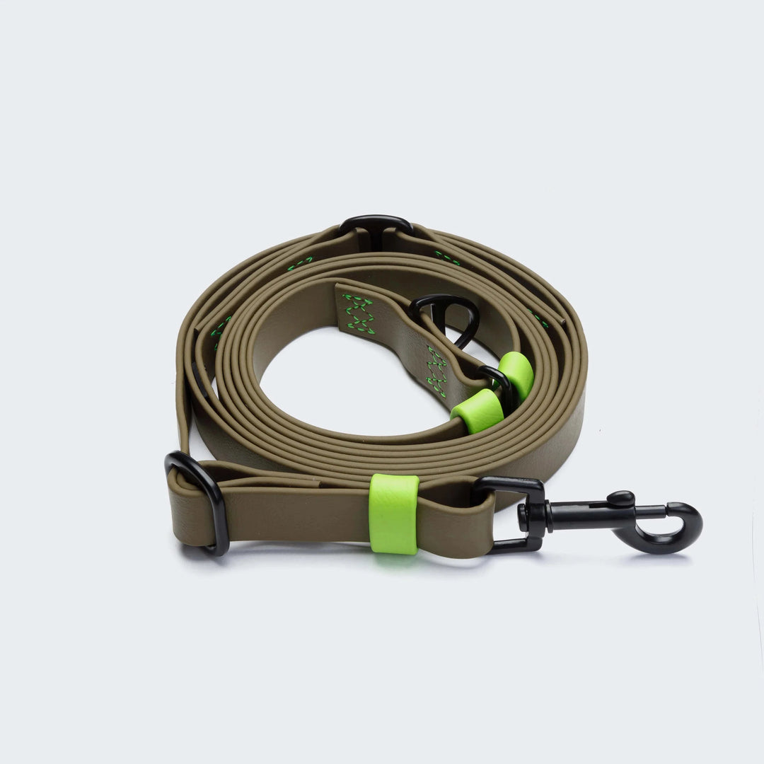 Cloud7 - IPANEMA Adjustable Dog Leash BioThane in beige with black hardware and neon yellow accents rolled up on white background