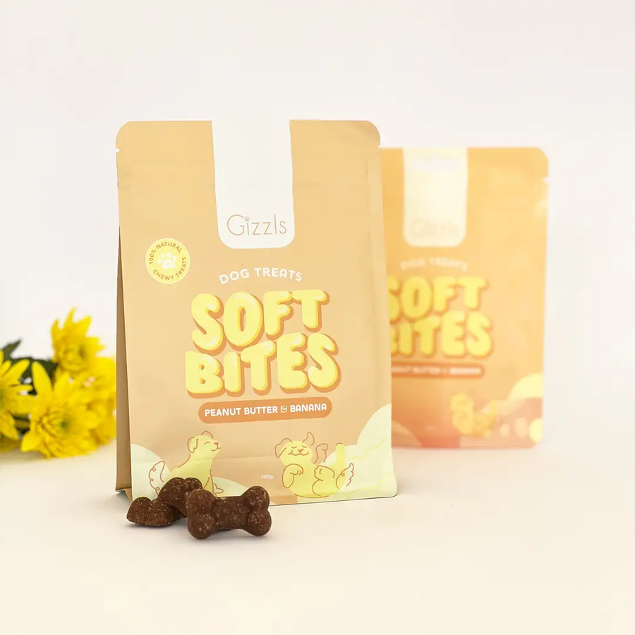 Soft Peanut Butter & Banana dog treats in eco-friendly packaging for dog wellbeing and training by Gizzls - SOFT BITES