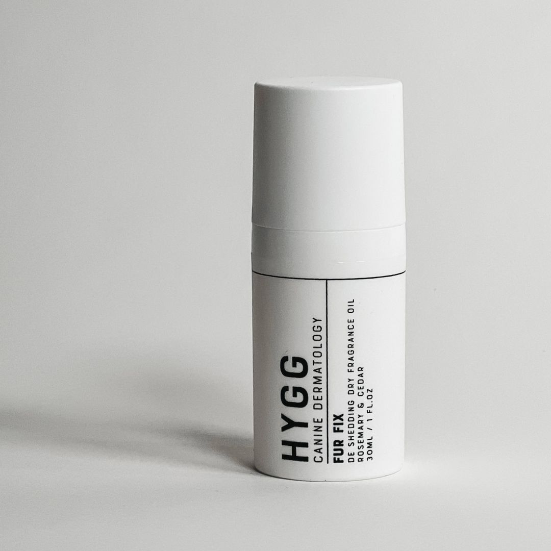 White bottle of non-residue dry dog cologne for fur shine and care, FUR FIX Fragrance by Hygg.