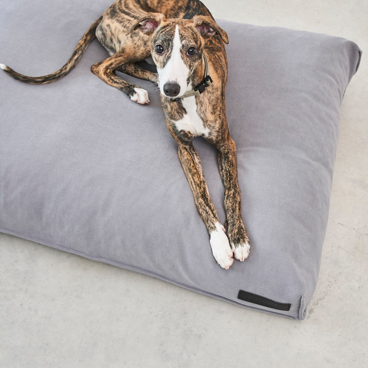 Soft gray COMODO dog cushion by MiaCara designed for pet comfort and natural nesting behavior support