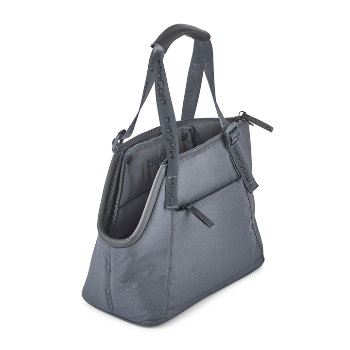 Gray soft-padded SPORTA dog carrier bag with adjustable straps for comfortable travel by Miacara