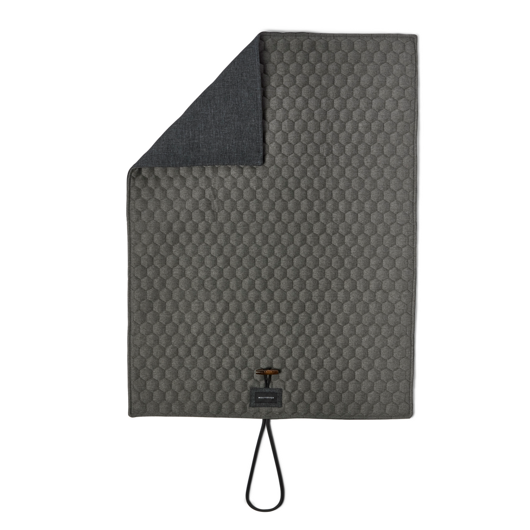 Honeycomb padded travel dog mat in gray with water-repellent top for comfort and durability by Molly&Stitch