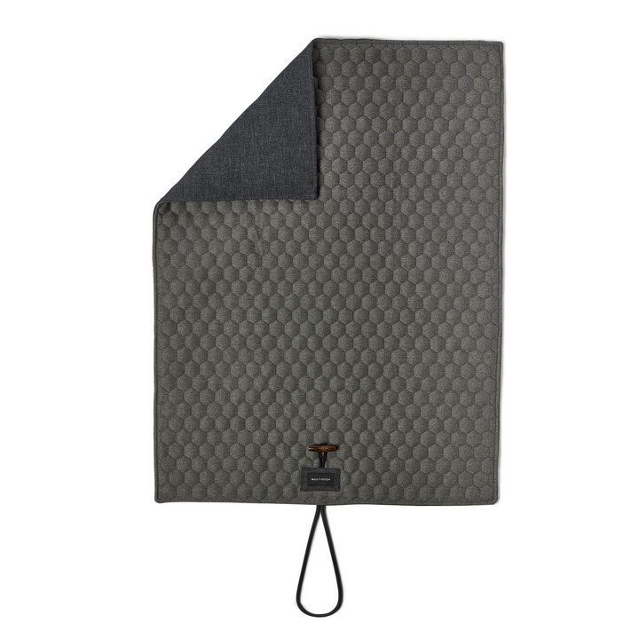 Honeycomb padded travel dog mat in gray with water-repellent top for comfort and durability by Molly&Stitch