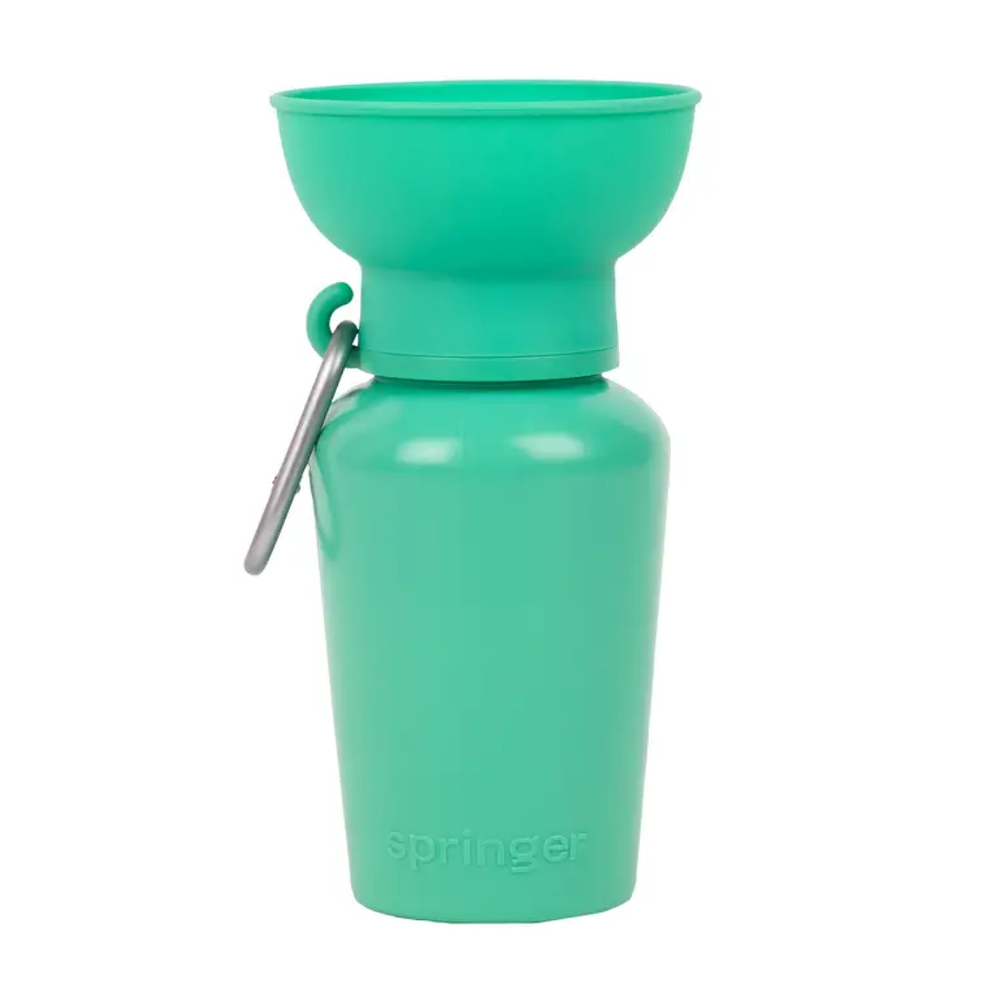 Turquoise portable dog water bottle with built-in bowl and carabiner clip.
