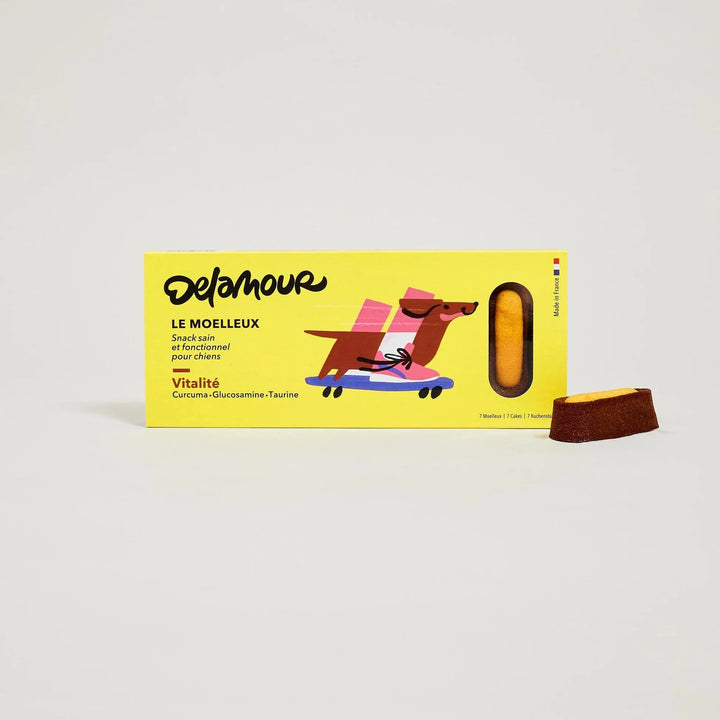 Yellow box of soft vegan dog treats with turmeric and spirulina for vitality support by DeLamour - Le Moelleux Vitality Vegan Dog Treats DeLamour